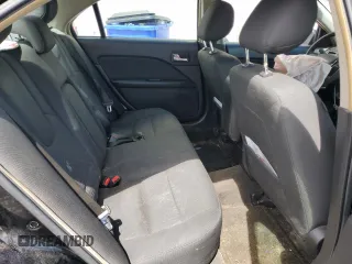 2012 Ford Fusion SE z VIN 3FAHP0HGXCR117692, wystawiony jako Copart lot #56026555 z przebiegiem 236 669 mil mil oraz Szkoda całkowita • Salvage title. Historia ofert i sprzedaży dostępna na DreamBid. Obrazek 10.