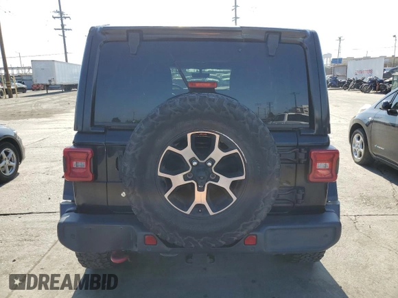 2018 Jeep Wrangler Unlimited Rubicon with VIN 1C4HJXFGXJW255881, listed as a Copart auction lot 62958975 with 39,439 mi miles and Salvage title. Bid and sale history available at DreamBid. Image 6.