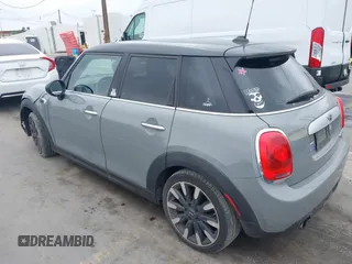 2015 MINI Hardtop 4 Door with VIN WMWXS5C57FT832162, listed as a IAAI auction lot 42159929 with 117,683 mi miles and . Bid and sale history available at DreamBid. Image 3.