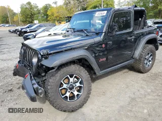 2023 Jeep Wrangler Rubicon with VIN 1C4HJXCGXPW545938, listed as a Copart auction lot 73939634 with 13,590 mi miles and Salvage title. Bid and sale history available at DreamBid. Image 1.