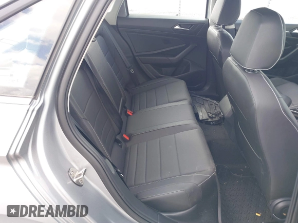 2023 Volkswagen Jetta SE z VIN 3VW7M7BU2PM056005, wystawiony jako IAAI lot #41768826 z przebiegiem 33 838 mil mil oraz . Historia ofert i sprzedaży dostępna na DreamBid. Obrazek 8.