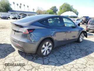 2022 Tesla Model Y Long Range with VIN 7SAYGDEE1NF391553, listed as a Copart auction lot 48259445 with Not Provided miles and Salvage Title. Bid and sale history available at carsss.com. Image 3.