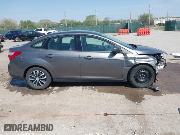 2012 Ford Focus SE с VIN 1FAHP3F20CL456565, выставлен на аукционе IAAI как лот 42045389 с пробегом 164 323 миль миль и . История ставок и продаж доступна на DreamBid. Изображение 14.
