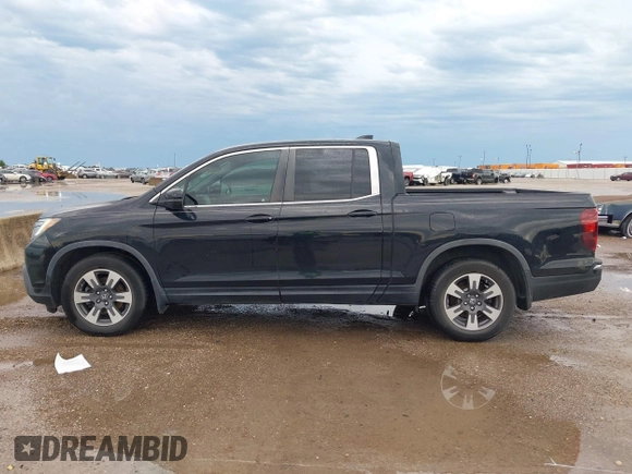 2017 Honda Ridgeline RTL-T with VIN 5FPYK2F64HB003542, listed as a IAAI auction lot 42171243 with 102,071 mi miles and . Bid and sale history available at DreamBid. Image 14.