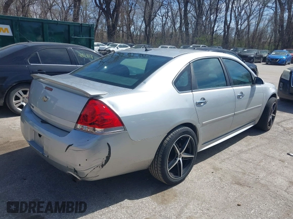 2013 Chevrolet Impala LTZ with VIN 2G1WC5E38D1235332, listed as a IAAI auction lot 41891472 with 137,567 mi miles and . Bid and sale history available at DreamBid. Image 4.