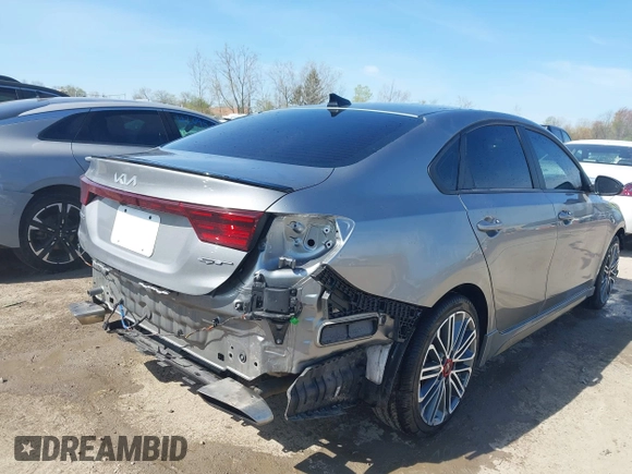 2022 Kia Forte GT with VIN 3KPF44AC6NE449955, listed as a IAAI auction lot 42104499 with 59,366 mi miles and . Bid and sale history available at carsss.com. Image 4.