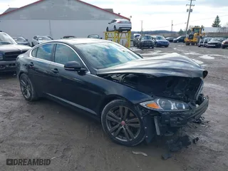 2013 Jaguar XF I4 RWD with VIN SAJWA0ES1DPS92662, listed as a IAAI auction lot 41528102 with 73,730 mi miles. Bid and sale history available at carsss.com. Image 1.
