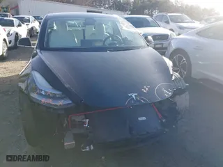 2019 Tesla Model 3 Mid Range with VIN 5YJ3E1EA4KF317872, listed as a IAAI auction lot 41491269 with 90,772 mi miles. Bid and sale history available at carsss.com. Image 6.