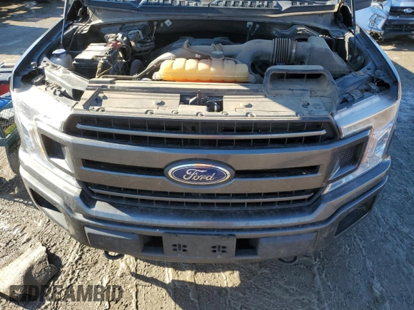 2018 Ford F-150 XL with VIN 1FTEW1EP3JFB40624, listed as a Copart auction lot 88748165 with 101,674 mi miles and Salvage title. Bid and sale history available at DreamBid. Image 12.