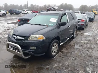 2004 Acura MDX Touring Pkg with VIN 2HNYD18684H532713, listed as a IAAI auction lot 41525616 with 219,241 mi miles. Bid and sale history available at carsss.com. Image 2.