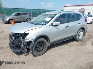 2017 Nissan Rogue SV with VIN 5N1AT2MV5HC798823, listed as a IAAI auction lot 42556631 with 157,721 mi miles and . Bid and sale history available at DreamBid. Image 17.