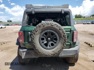 2022 Ford Bronco с VIN 1FMEE5DP0NLA72491, выставлен на аукционе Copart как лот 62482815 с пробегом 80 184 миль миль и Списание • Salvage title. История ставок и продаж доступна на DreamBid. Изображение 6.
