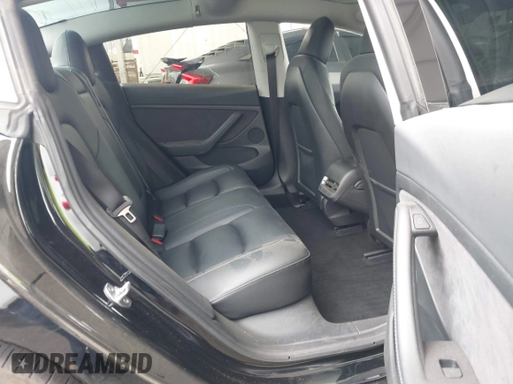 2023 Tesla Model 3 with VIN 5YJ3E1EA7PF473749, listed as a IAAI auction lot 41921478 with 21,483 mi miles and . Bid and sale history available at DreamBid. Image 8.