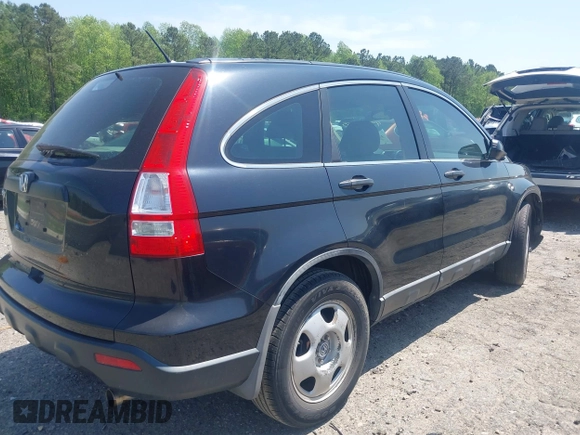 2007 Honda CR-V LX with VIN 5J6RE38377L000654, listed as a IAAI auction lot 42031455 with 112,869 mi miles. Bid and sale history available at carsss.com. Image 4.