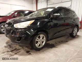 2013 Hyundai Tucson GLS with VIN KM8JU3AC0DU754948, listed as a IAAI auction lot 41811891 with 139,056 mi miles. Bid and sale history available at carsss.com. Image 22.