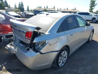 2014 Chevrolet Cruze LS with VIN 1G1PA5SG3E7270009, listed as a IAAI auction lot 40033837 with 94,577 mi miles. Bid and sale history available at carsss.com. Image 4.