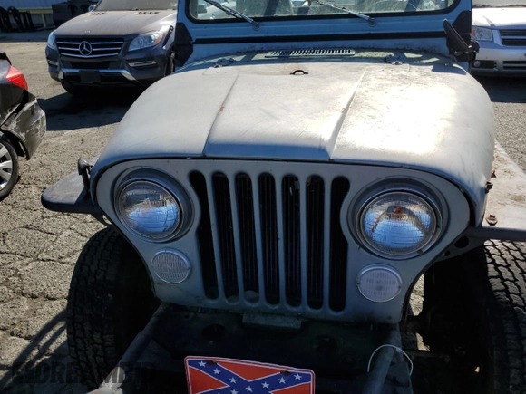 1985 Jeep CJ z VIN 1JCCF87E7FT035118, wystawiony jako Copart lot #70082064 z przebiegiem Nie podano mil oraz Tytuł czysty. Historia ofert i sprzedaży dostępna na DreamBid. Obrazek 11.