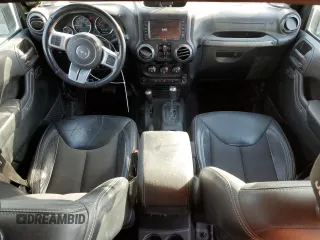 2018 Jeep Wrangler JK Unlimited Sport S with VIN 1C4BJWDG8JL812324, listed as a Copart auction lot 76595354 with 140,013 mi miles and Salvage Title. Bid and sale history available at carsss.com. Image 8.