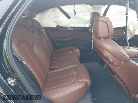 2012 Audi A8 with VIN WAURVAFDXCN017546, listed as a IAAI auction lot 39830968 with 123,089 mi miles and . Bid and sale history available at DreamBid. Image 8.
