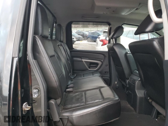 2015 Nissan Titan Pro-4X with VIN 1N6AA0EC2FN501632, listed as a Copart auction lot 84063524 with 92,342 mi miles and Salvage title. Bid and sale history available at DreamBid. Image 10.