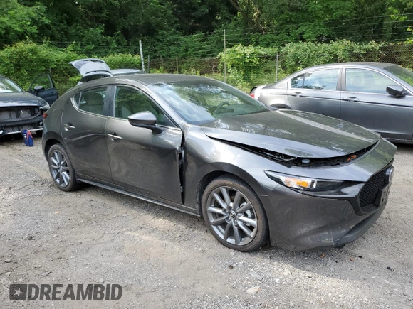 2024 Mazda 3 S Preferred with VIN JM1BPALM3R1657763, listed as a Copart auction lot 63000355 with 14,377 mi miles and Salvage title. Bid and sale history available at DreamBid. Image 4.