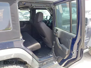2013 Jeep Wrangler Unlimited Sport with VIN 1C4BJWDGXDL564226, listed as a IAAI auction lot 42042448 with 99,939 mi miles. Bid and sale history available at carsss.com. Image 8.