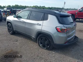 2018 Jeep Compass Latitude with VIN 3C4NJDBBXJT402489, listed as a IAAI auction lot 42369108 with 126,939 mi miles and . Bid and sale history available at DreamBid. Image 3.