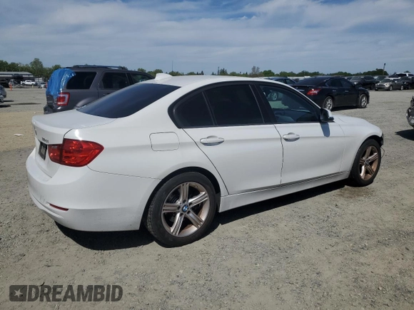 2015 BMW 3 Series 320i with VIN WBA3B1C52FK136581, listed as a Copart auction lot 52803405 with 138,495 mi miles and Salvage Title. Bid and sale history available at carsss.com. Image 3.