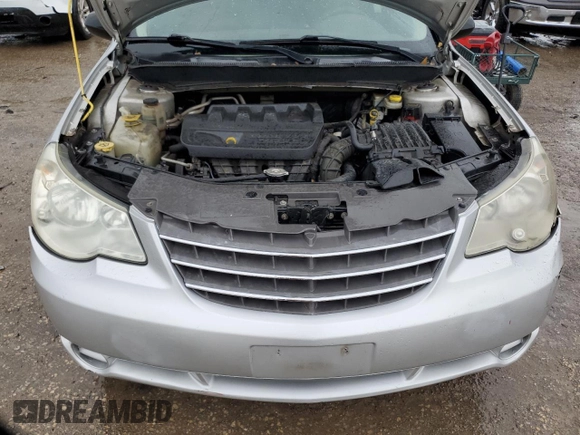 2010 Chrysler Sebring Touring with VIN 1C3CC4FB5AN121135, listed as a Copart auction lot 81127464 with 168,089 mi miles and Salvage Title. Bid and sale history available at carsss.com. Image 12.