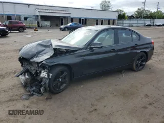 2014 BMW 3 Series 328i xDrive with VIN WBA3B5G55ENS10879, listed as a Copart auction lot 58829515 with 107,414 mi miles and Salvage title. Bid and sale history available at DreamBid. Image 1.