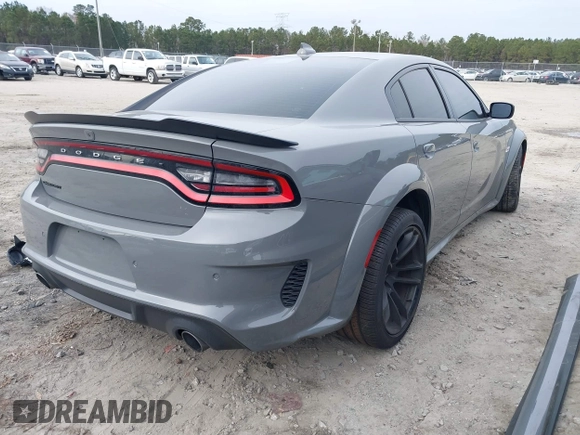 2023 Dodge Charger Scat Pack Widebody with VIN 2C3CDXGJ6PH646050, listed as a IAAI auction lot 41175513 with 7,684 mi miles and . Bid and sale history available at DreamBid. Image 4.