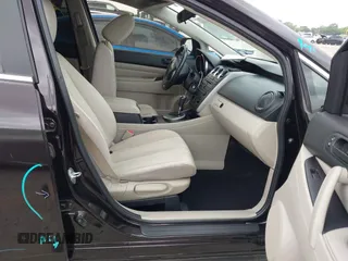2012 Mazda CX-7 i Sport z VIN JM3ER2BM6C0411521, wystawiony jako IAAI lot #42146404 z przebiegiem 131 765 mil mil oraz . Historia ofert i sprzedaży dostępna na DreamBid. Obrazek 5.