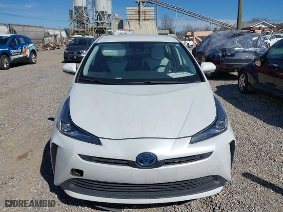 2021 Toyota Prius L Eco with VIN JTDKAMFUXM3142402, listed as a IAAI auction lot 41665484 with 67,416 mi miles. Bid and sale history available at carsss.com. Image 12.
