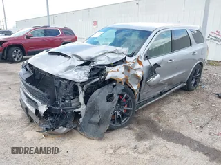 2018 Dodge Durango SRT with VIN 1C4SDJGJ5JC256006, listed as a IAAI auction lot 41038356 with 71,385 mi miles and . Bid and sale history available at DreamBid. Image 19.