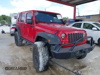 2014 Jeep Wrangler Unlimited Rubicon with VIN 1C4BJWFG7EL138038, listed as a IAAI auction lot 42173040 with 101,582 mi miles and . Bid and sale history available at DreamBid. Image 1.