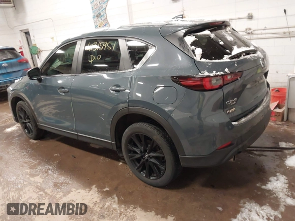 2023 Mazda CX-5 2.5 S Carbon Edition with VIN JM3KFBCM2P0191682, listed as a IAAI auction lot 41315951 with 36,285 mi miles. Bid and sale history available at carsss.com. Image 3.