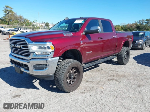2019 Ram 2500 Laramie with VIN 3C6UR5FL1KG537617, listed as a IAAI auction lot 41076191 with 82,818 mi miles. Bid and sale history available at carsss.com. Image 2.