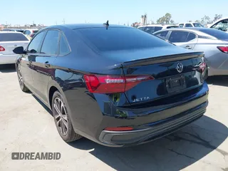 2023 Volkswagen Jetta Sport with VIN 3VWBM7BU1PM041957, listed as a IAAI auction lot 42293989 with 31,737 mi miles and . Bid and sale history available at DreamBid. Image 3.