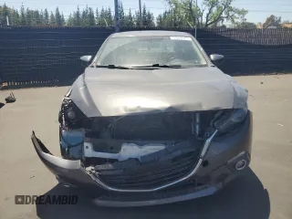 2014 Mazda 3 S Touring with VIN JM1BM1V39E1145478, listed as a Copart auction lot 57860645 with 55,322 mi miles and Salvage title. Bid and sale history available at DreamBid. Image 5.