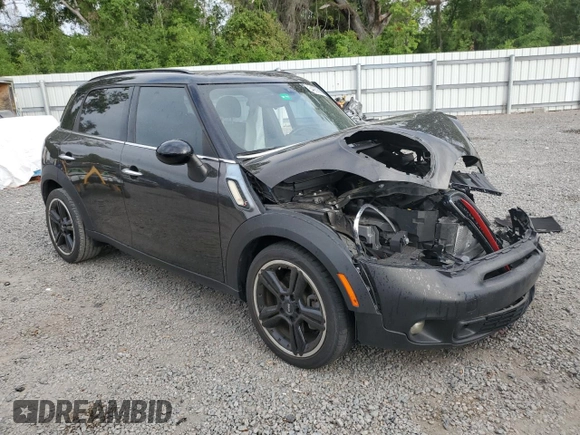 2015 MINI Countryman S with VIN WMWZC3C57FWP52868, listed as a Copart auction lot 54909085 with 68,003 mi miles and Salvage title. Bid and sale history available at DreamBid. Image 4.