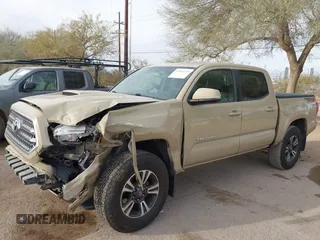 2017 Toyota Tacoma SR5 with VIN 3TMCZ5AN2HM063328, listed as a IAAI auction lot 41541775 with 137,610 mi miles and . Bid and sale history available at DreamBid. Image 6.
