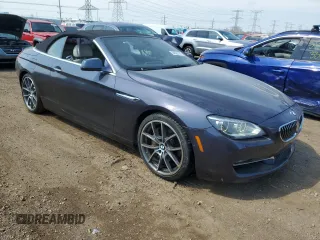 2012 BMW 6 Series 650i z VIN WBALZ3C57CDL71551, wystawiony jako Copart lot #54622705 z przebiegiem Nie podano mil oraz Szkody całkowita. Historia ofert i sprzedaży dostępna na DreamBid. Obrazek 4.
