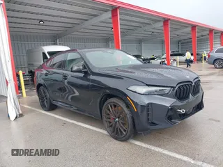 2025 BMW X6 M60i with VIN 5UX43EX0XS9W73189, listed as a IAAI auction lot 39897509 with 1,170 mi miles. Bid and sale history available at carsss.com. Image 1.