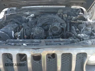 2019 Jeep Wrangler Unlimited Sport S with VIN 1C4HJXDG2KW558562, listed as a IAAI auction lot 42100717 with Not provided miles and . Bid and sale history available at DreamBid. Image 10.