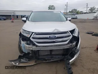 2016 Ford Edge SEL z VIN 2FMPK4J94GBB25424, wystawiony jako Copart lot #57108405 z przebiegiem 130 397 mil mil oraz Szkoda całkowita • Salvage title. Historia ofert i sprzedaży dostępna na DreamBid. Obrazek 5.