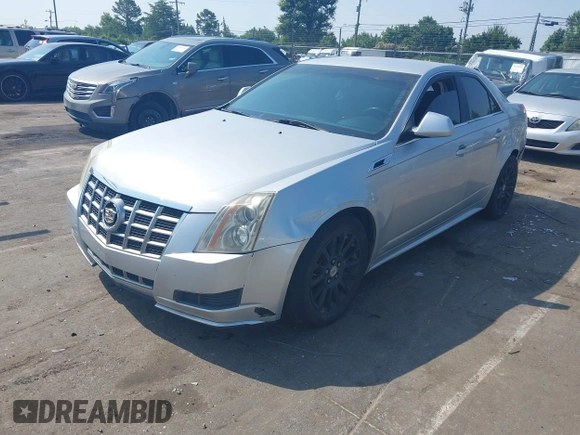 2012 Cadillac CTS with VIN 1G6DC5E51C0156873, listed as a IAAI auction lot 42587421 with 169,006 mi miles and . Bid and sale history available at DreamBid. Image 2.