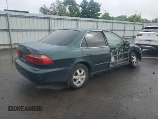 2000 Honda Accord SE with VIN 1HGCG6692YA141564, listed as a Copart auction lot 57423295 with 190,057 mi miles and Salvage title. Bid and sale history available at DreamBid. Image 3.