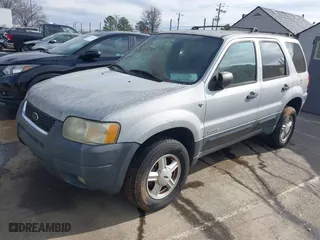2002 Ford Escape XLT Choice with VIN 1FMYU03172KD11228, listed as a IAAI auction lot 41556852 with 250,677 mi miles. Bid and sale history available at carsss.com. Image 2.