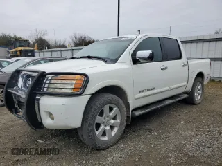 2011 Nissan Titan Pro-4X z VIN 1N6AA0EC6BN307938, wystawiony jako Copart lot #43291565 z przebiegiem 102 639 mil mil oraz Tytuł czysty. Historia ofert i sprzedaży dostępna na DreamBid. Obrazek 1.