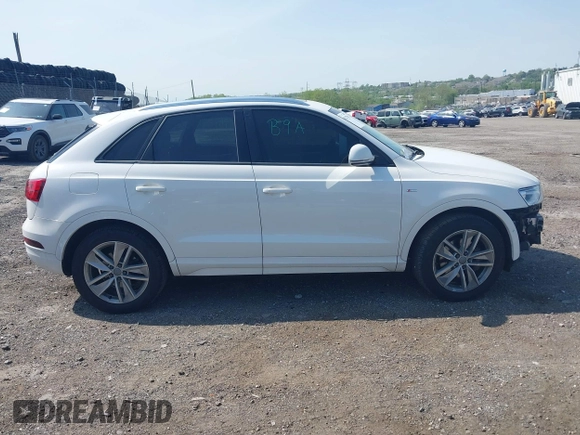 2018 Audi Q3 Premium with VIN WA1ECCFS3JR016577, listed as a IAAI auction lot 42177891 with 91,876 mi miles and . Bid and sale history available at DreamBid. Image 13.